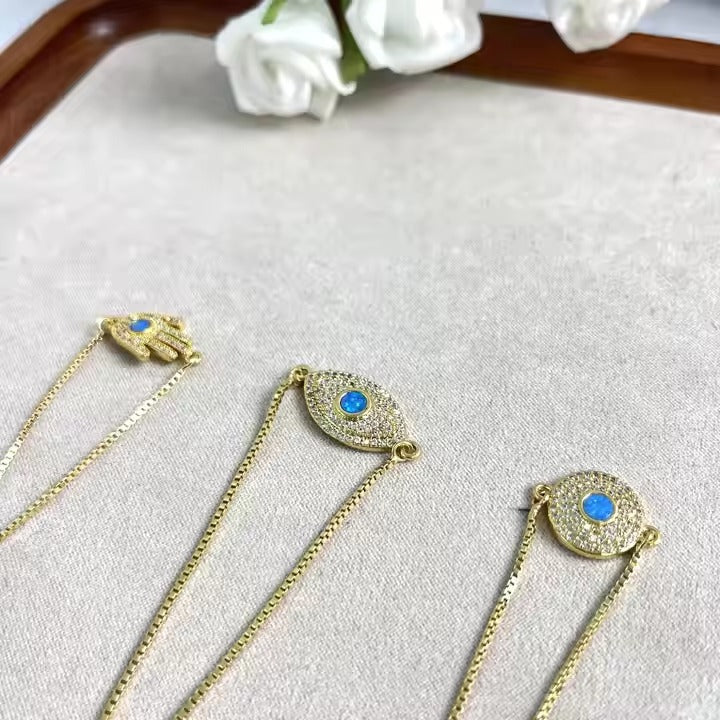 Hamsa, onda ögat & opal charm armband
